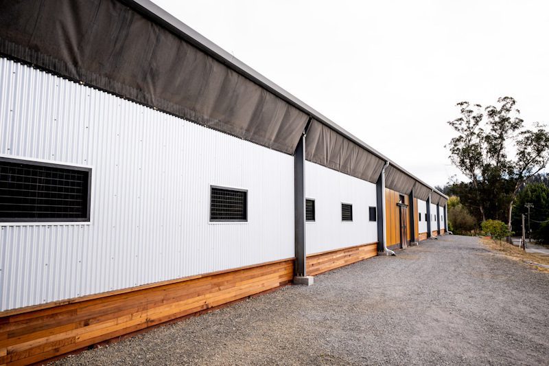 covered arena side view